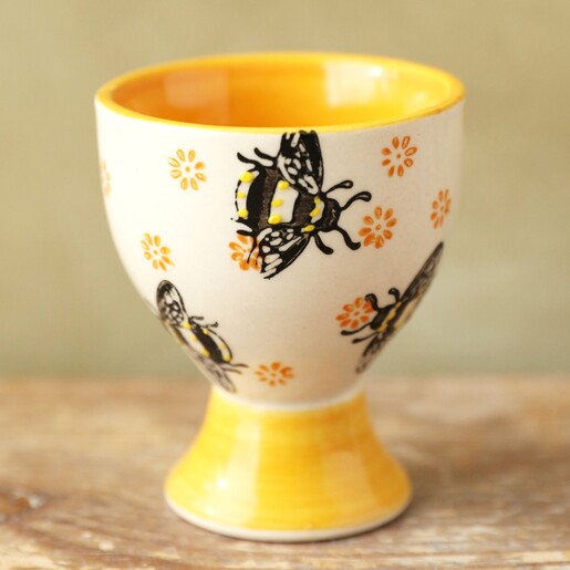 Sass & Belle Busy Bee Egg Cup on wooden table