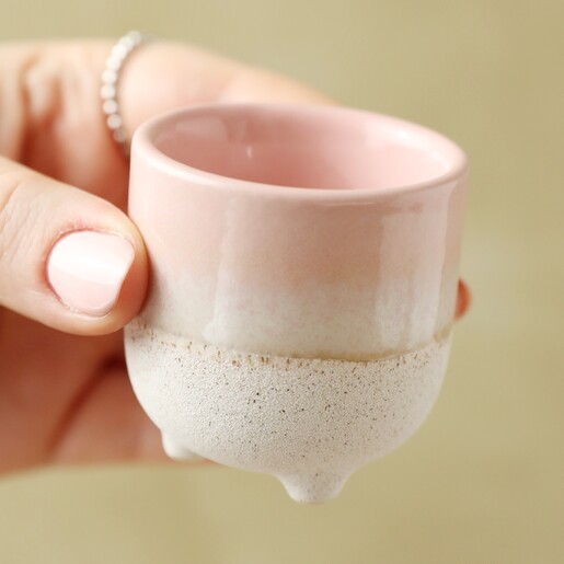 Model holding Sass & Belle Mojave Glaze Pink Egg Cup
