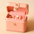 Rings Stored Inside Petite Travel Ring Box in Pink
