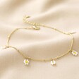 Beaded Daisy Satellite Chain Anklet in Gold in Full on Fabric