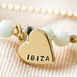 close up of personalised heart charm with Ibiza on for Personalised Semi-Precious Stone Bead and Chain Anklet in Pastel Blue