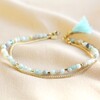 Semi-Precious Stone Bead and Chain Anklet in Pastel Blue on fabric background