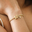 Model Wearing Gold Stainless Steel Organic T Bar Bracelet
