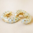 Blue Geometric Enamel Hoop Earrings in Gold on Fabric