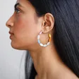 Model Wearing Colourful Glass Beaded Hoop Earrings in Gold