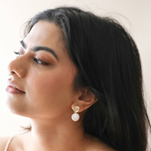 Earrings on Model Molten Pearl Drop Earrings in Gold on Model
