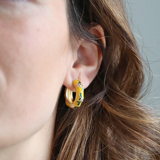 Brunette Model Wearing Mustard Floral Enamel Hoop Earrings in Gold