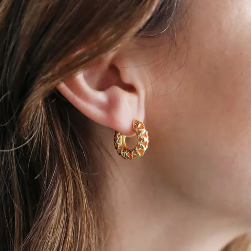Model Wearing Orange Geometric Enamel Hoop Earrings in Gold