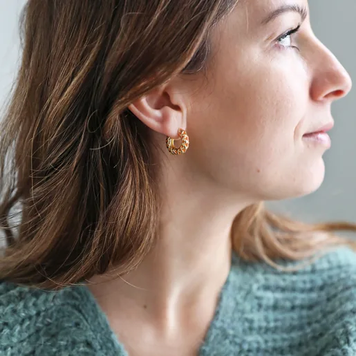 Orange Geometric Enamel Hoop Earrings in Gold on Model