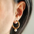 Model Wearing Organic Hoop Earrings with Pearl