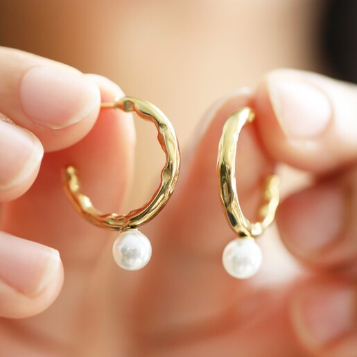 Close-up Shot of Gold Hoop Earrings