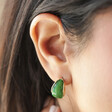 Small Green Resin Hoop Earrings in Gold on Model