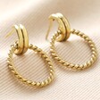 Close-up of Gold Twisted Drop Hoop Earrings