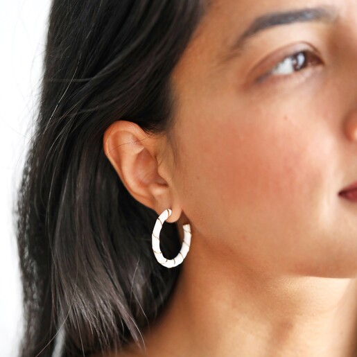 On Model Model Wearing White Enamel Rope Hoop Earrings in Gold