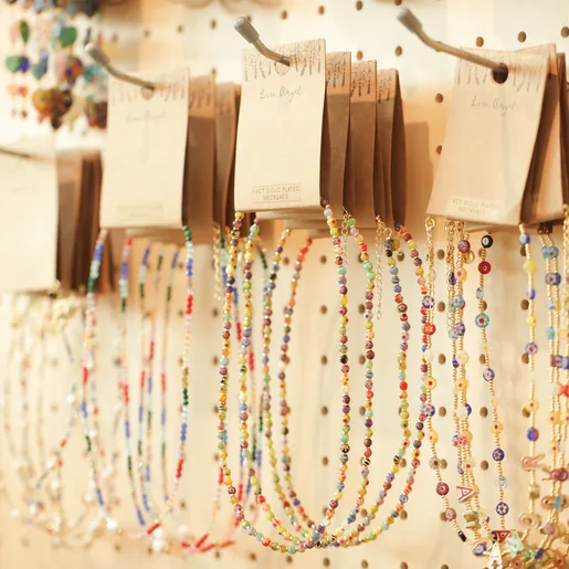 Colourful Mixed Beads Necklace in Gold on packaging