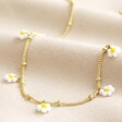 Beaded Daisy Satellite Chain Necklace in Gold on Beige Fabric
