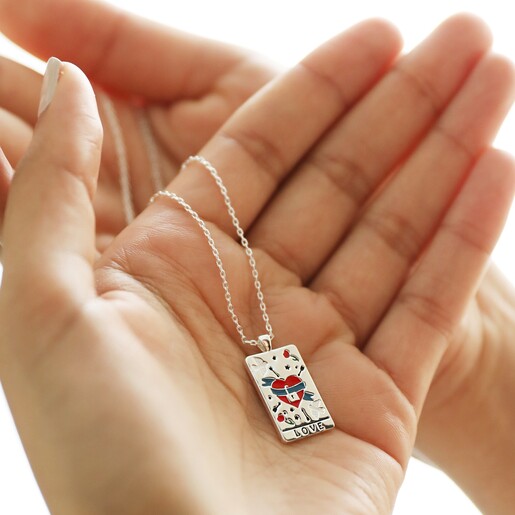 Model Holding Love Tarot Enamel Pendant Necklace in Silver