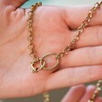 Model Holding Polished Round Clasp and Hoop Necklace