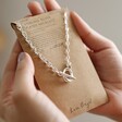 Model Holding Stainless Steel T-Bar Chain Necklace in Silver on Card