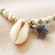 Close Up of Shell on White Beaded Shell Charm Necklace