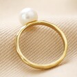 Close Up of Pearl Ring in Hammered Gold