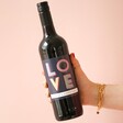 Model Holding Personalised Bold Love Valentine's Day Wine