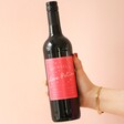 Model Holding Personalised Love Potion Valentine's Day Red Wine