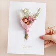 Model Holding Personalised Vinyl Dried Flower Mother's Day Card with Gold Debossed Font
