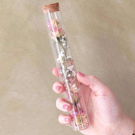 Model Holding Large Dried Flower Glass Bottle