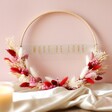 Must Be Love Valentine's Dried Flower Bamboo Hoop Wreath on Table