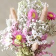 Close Up of Flowers from Pink and Yellow Dried Flower Posy with Vase