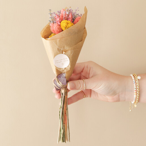 Model Holding Rainbow Brights Dried Flower Posy Letterbox Gift with Amethyst