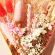 Close Up of Valentine's Dried Flower Posy with Engraved Stick