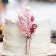 Close-up of Blush Pink Dried Flower Cake Topper