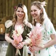 Blush Pink Dried Flower Wedding Posy Held by Bridesmaid