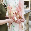 Blush Pink Dried Flower Wedding Bouquet Held by Models