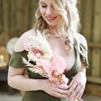 Bridesmaid Holding Blush Pink Dried Flower Wedding Posy