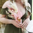 Model Holding Blush Pink Dried Flower Wedding Posy