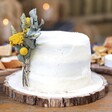 White Cake with Eucalyptus and Yellow Dried Flower Cake Topper