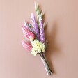 Pastel Dried Flower Buttonhole on Neutral Background