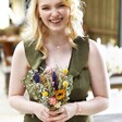 Summer Meadow Dried Flower Bridesmaid Bouquet Held by Model