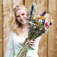 Model Holding Out Summer Meadow Dried Flower Wedding Bouquet