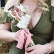 Model Holding Vintage Pink Dried Flower Wedding Posy