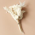 Vintage White Dried Flower Buttonhole on Neutral Background