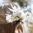 Close-up of Vintage White Dried Flower Hair Comb