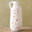 Abstract Design Stoneware Jug on Wooden Table