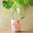 Large Pink and Terracotta Abstract Face Planter, H19cm with large plant inside