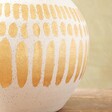 close up of the hand-painted gold abstract patternon Large Round Hand-Painted Vase in White
