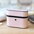 Vegan Leather AirPods PRO Case in Pink on Wooden Surface