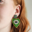 Model Wearing Green Bead Eye Heart Drop Earrings
